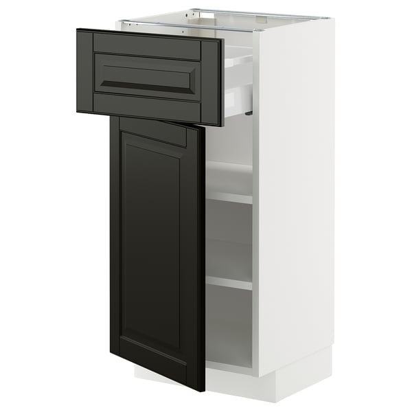 Modern white kitchen cabinet with black drawer and door, sleek design.