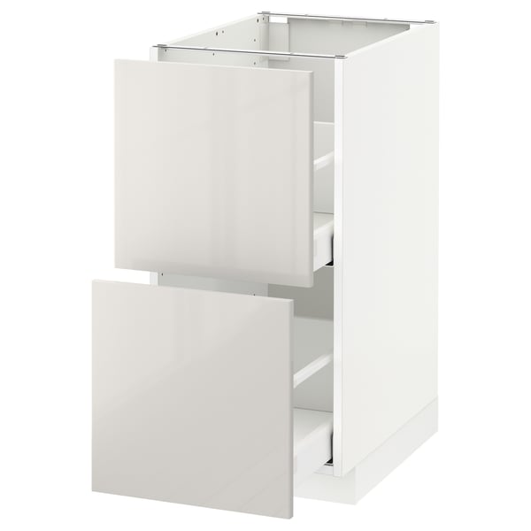 METOD kitchen cabinet, white, glossy finish, rectangular shape, with open drawers.