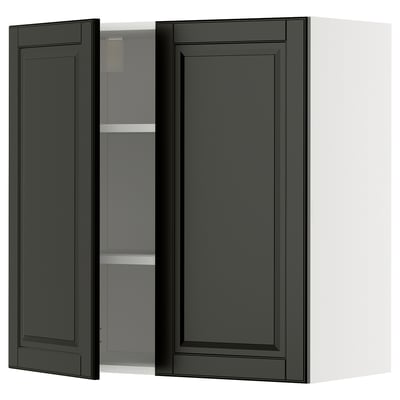 A black METOD kitchen wall cabinet with two doors open, revealing an adjustable shelf inside.
