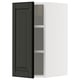 Black METOD kitchen cabinet with white interior and adjustable shelf, rectangular shape.