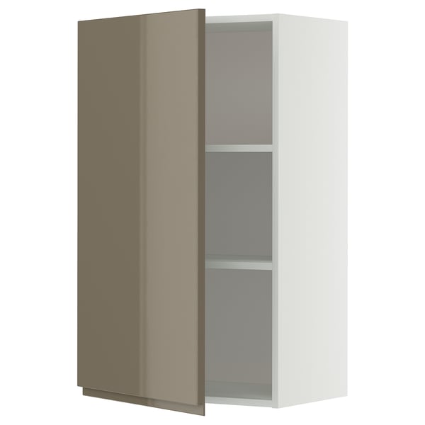 Wall-mounted white cabinet with glossy dark door, slightly ajar revealing shelves.