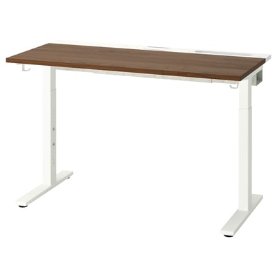 An adjustable height desk named MITTZON with a wooden top and white metal legs, designed for ergonomic use.