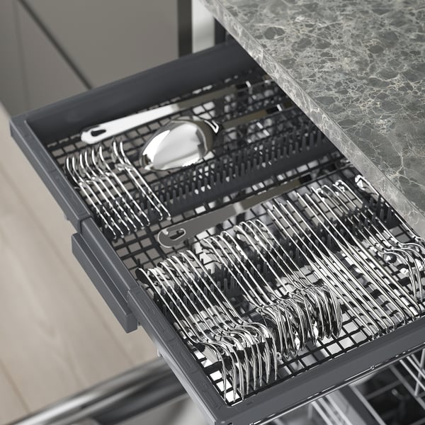 Open dishwasher with organised cutlery. Top rack has forks, knives, and spoons. Bottom has additional compartments.