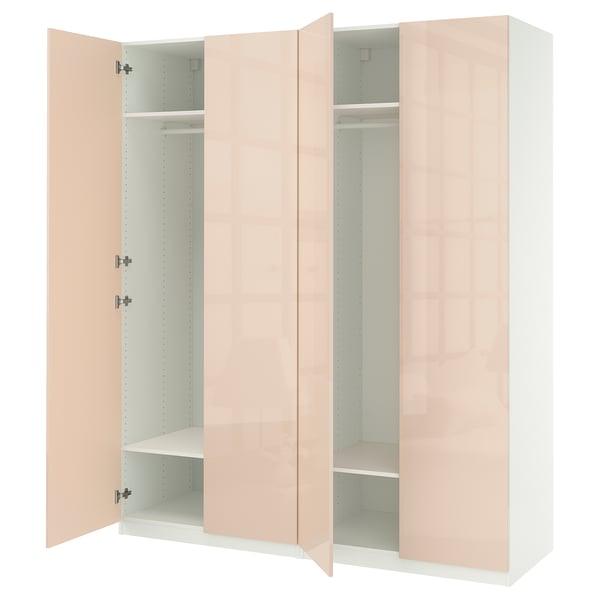 An open beige PAX wardrobe, featuring shelves and a rail inside.