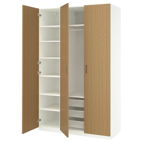 Open wooden wardrobe with white interior, shelves, and drawers.