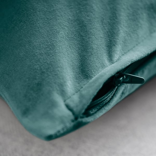 Zippered teal cushion cover in soft cotton velvet.