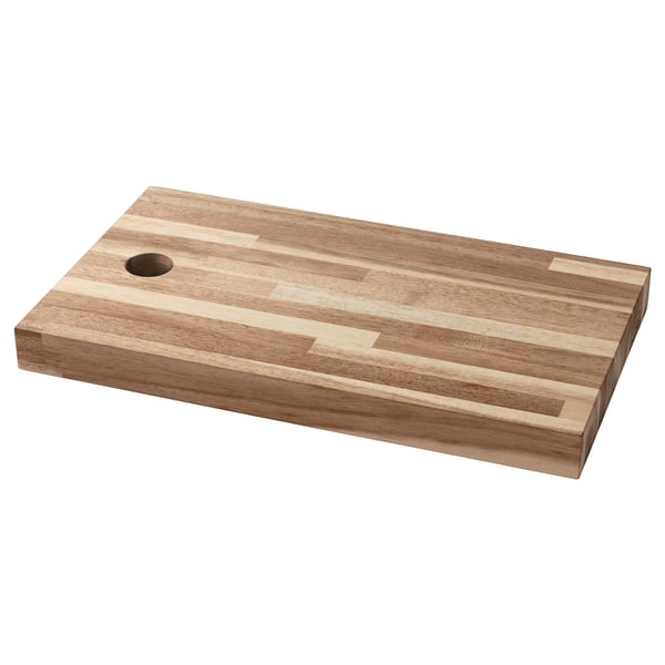 SKOGSTA wooden cutting board, rectangular, brown, made of solid acacia, with a smooth surface and a hole on the left side.