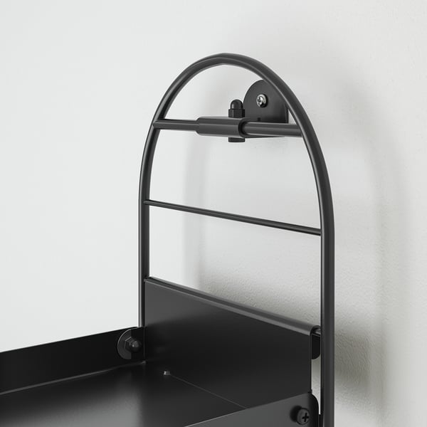 Black metal wall-mounted shelf with three tiers. Strong and minimalistic design ideal for home decor.