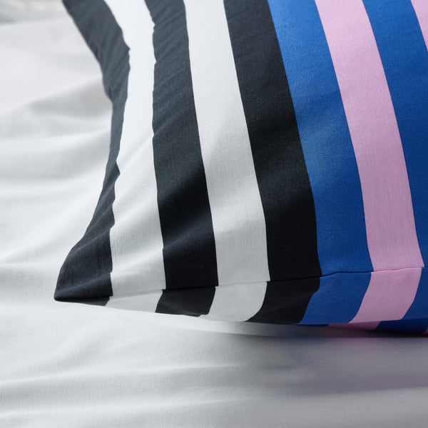 Striped pillowcase, folded, with black, white, blue, pink stripes. High-quality cotton-viscose blend with even stitching.