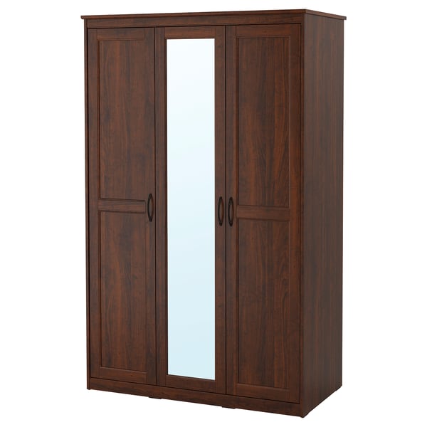 A dark brown SONGESAND wardrobe with mirrored doors, featuring classic panelled design and adjustable shelves.