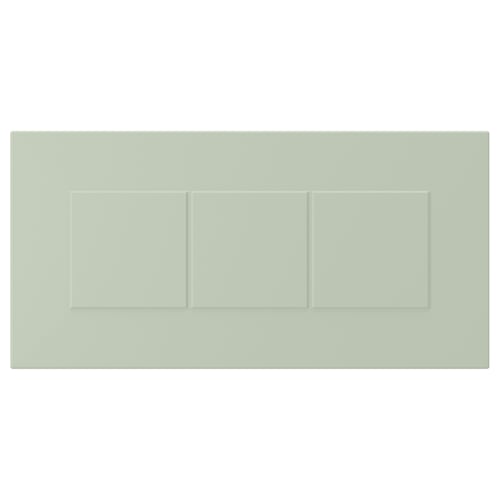 Green cabinet door with grooved panels, fiberboard, polyurethane, and acrylic paint.