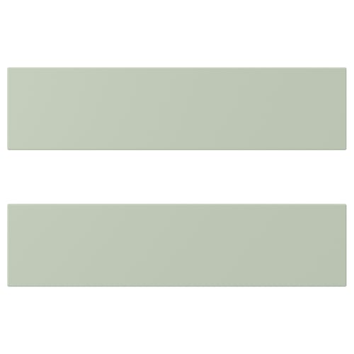 Two long, green rectangular panels with grooved textures are displayed horizontally, one above the other.
