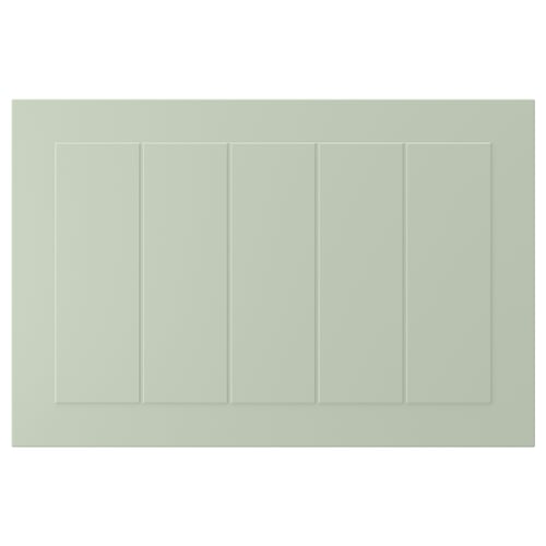 A green, rectangular STENSUND cabinet door with grooved panels. Its made from fibreboard and coated with polyurethane and acrylic paint.