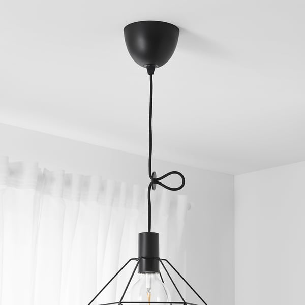 Ceiling light with adjustable cord, hanging bulb shade, modern look, white curtain background.