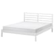TARVA bed: white-stained pine frame, metal screws, simple design, ideal for minimalist rooms.