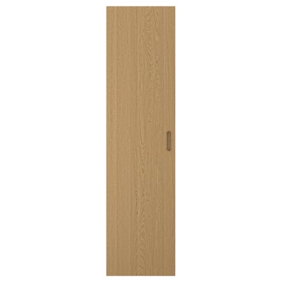 A TONSTAD wooden door in natural oak. It has a sleek, rectangular shape with a vertical handle.