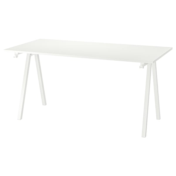 A trotton table with a white top and legs. It has a rectangular shape and simple, modern design.