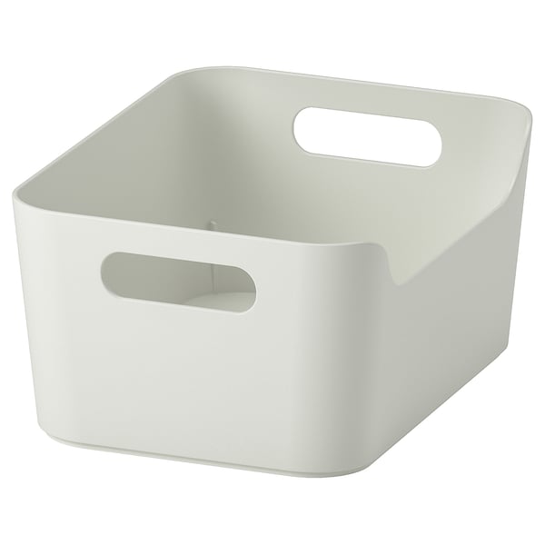 A white UPPDATERA storage box with two handles. Its square-shaped with rounded corners, useful for organising and carrying items.