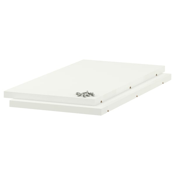 A set of white UTRUSTA melamine shelves, rectangular in shape and strong, ready to be assembled.