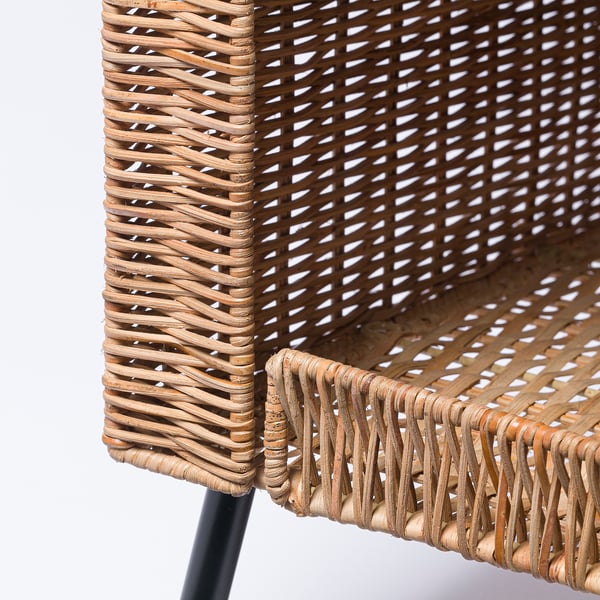 Woven rattan cat house, beautifully crafted with natural, sturdy material and dark legs, offering cosy comfort for pets.