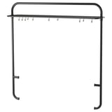 Black metal kitchen rack with hooks and shelf, minimalist design.