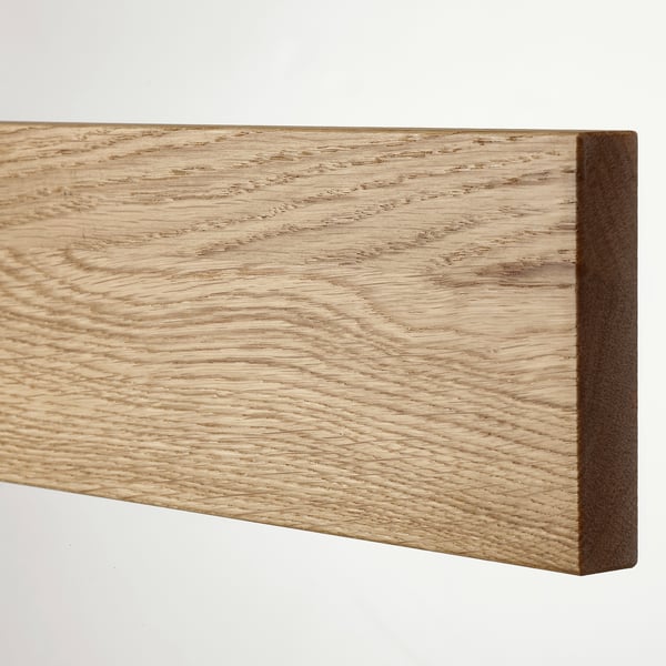 Close-up of natural wood grain texture on a smooth, polished wooden surface.