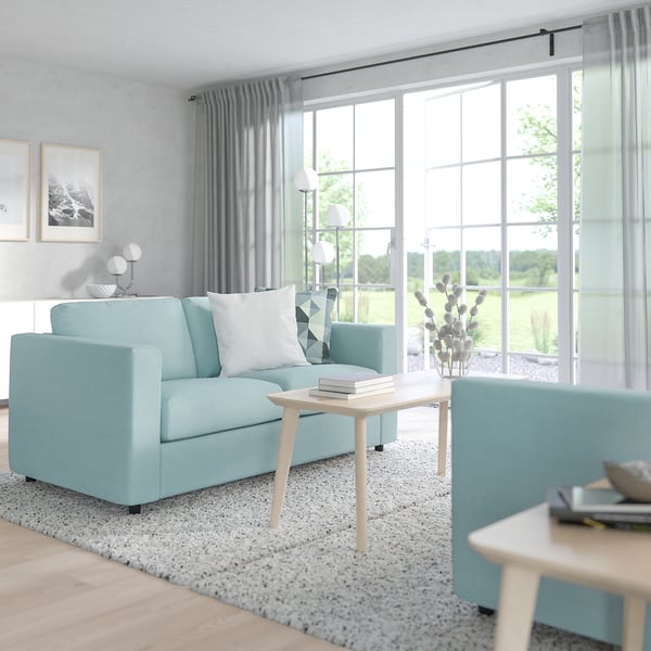 VIMLE light blue sofa set with coffee & end tables, near window.