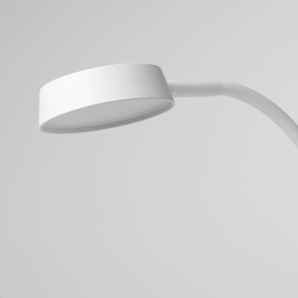 Modern white gooseneck lamp with adjustable arm and sleek design for precise lighting.