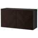 A dark brown, rectangular BESTÅ storage unit with chevron-patterned veneer doors, side panels, and a top.