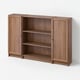 A brown BILLY bookcase with wooden texture, featuring closed and open shelves.