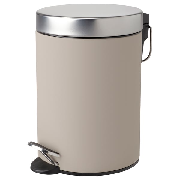 An EKOLN rubbish can in beige with a stainless steel lid and pedal. Rounded design with a handle on back.