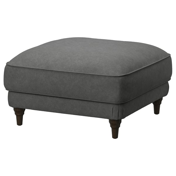 An ESSEBODA footstool in grey with turned wooden legs and a plush, rectangular shape for comfort.