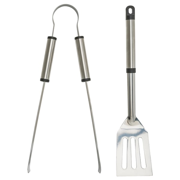 The GRILLTIDER bbq tool set featuring tongs and spatula with stainless steel handles and black plastic ends, ideal for grilling.