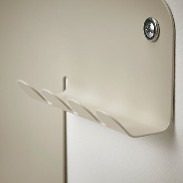 Magnetic wall organiser with shelf.