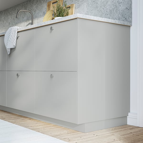 HAVSTORP light grey kitchen cabinets with sleek, smooth surfaces. Includes large cabinets and countertop with sink and accessories.