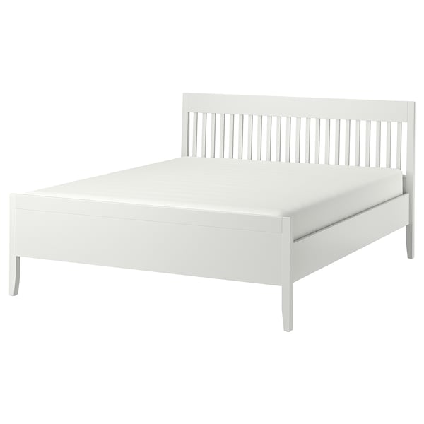 White IDANÄS bed, minimalist design, wooden frame with slatted headboard.
