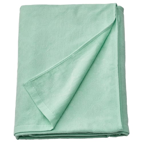 Light green JÄTTETUJA blanket, folded, lightweight with smooth texture.