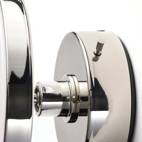 Modern wall lamp with adjustable light, silver finish, built-in led, and removable mirror.