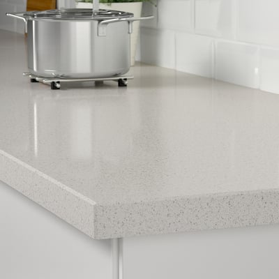Sleek quartz countertop, KASKER series by IKEA, shiny, stain-resistant, smooth edge.