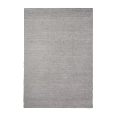 A KNARDRUP rug in light grey with a subtle shine. Its rectangular, thick, and soft, made from recycled polyester.
