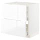 A white METOD kitchen cabinet with sleek, modern design and smooth surfaces. It includes multiple storage drawers and a spacious structure.
