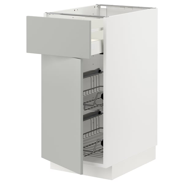 White METOD drawer unit with multiple wire baskets, modern minimalist kitchen storage.