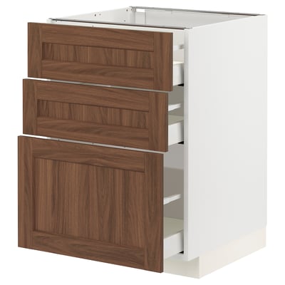 A modern white kitchen cabinet with three large brown wooden drawers on a white background. The drawers appear sleek and well-organized.