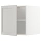 White kitchen cabinet, modern design, square shape, single door open, light grey interior, adjustable shelf, bevelled edges.