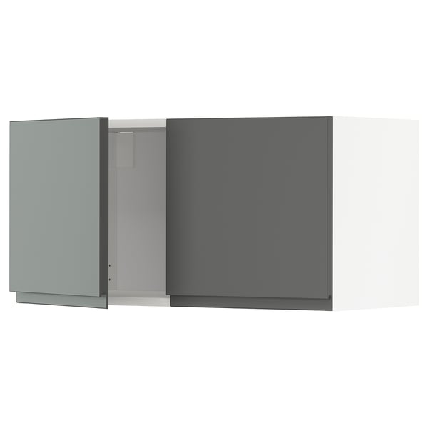 Modular kitchen cabinet in matt dark grey with minimalist design and integrated handles.
