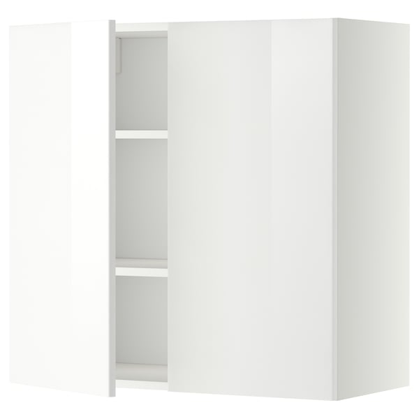 White METOD kitchen cabinet with glossy doors and shelf.
