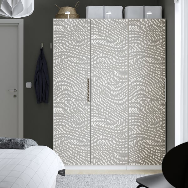 Grey MISTUDDEN wardrobe in bedroom, offering ample storage.