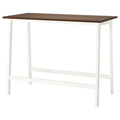 A MITTZON high conference table with a walnut veneer top and white legs. It has a rectangular shape and supports for standing meetings.