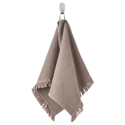VALLASÅN towel: gray-brown, waffle weave, cotton/viscose, fringe edges, hangs on hook.