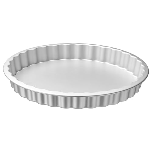 A white VARDAGEN pie dish with a fluted edge and anodized aluminium body, perfect for baking pies.